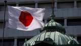 Japan central bank projects low inflation for years, signals delay in stimulus withdrawal Japan central bank projects low inflation for years, signals delay in stimulus withdrawal