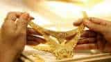 Gold Price Today: Yellow metal trades flat above Rs 49,000; buy on dips, say experts