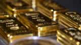 Gold dips below $1,800 as dollar, yields firm on rate hike bets