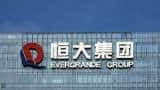 China Evergrande shares hit 11-year low after firm says no guarantee it can meet repayments