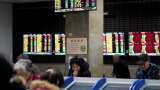 Asian shares advance, dollar soft as markets decide Omicron fallout limited