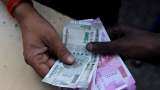 Rupee gains 24 paise to close at 75.02 against US dollar