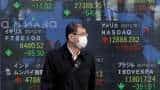 Asian shares cautiously higher as investors await Fed policy update