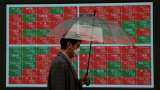 Stocks dive on surging inflation, Ukraine risks; China markets slump