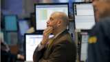 World shares fall on Ukraine conflict, looming U.S. rate hikes