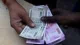 Rupee surges by 19 paise to 75.97 against US dollar