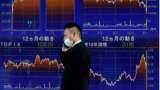 Asian shares track Wall Street higher as U.S. yields stabilise