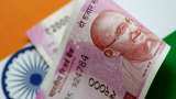 Rupee recovers from record lows to end 11 paise higher against dollar 