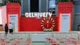 Delhivery IPO makes flat debut on bourses; lists at Rs 495 per share on NSE; what should investors do?  
