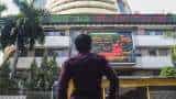 Closing Bell: Nifty slips below 16,400, Sensex declines over 200 points as RBI hikes repo rate; Realty, PSU Bank gain 