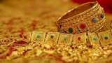 Gold declines Rs 205; silver down by Rs 926