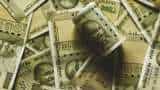 Rupee down 15 paise to all-time low of 79.60 against US dollar Rupee down 15 paise to all-time low of 79.60 against US dollar