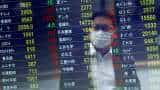 Asian shares bruised as U.S. inflation data boosts recession fear