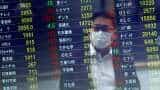 Asian shares slip ahead of crucial US inflation data