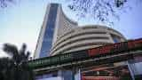 Final Trade: Indices End Flat After Volatile Trading; Sensex Settles 34 Pts Lower, Nifty Holds 18,700 | Closing Bell