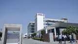 HCL Tech shares slip as Street cautious on lowered revenue guidance; brokerages mixed 