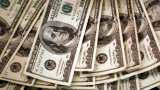 US dollar gains on rising US yields, British inflation lifts pound