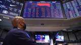 US stock markets end mixed, dollar dips as tech surges and recession fears weigh