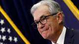 Fed holds benchmark US interest rate, sees two small hikes by end of year