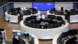 European shares slide on rate hike jitters after Powell comments, BoE hike