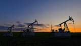 Oil settles lower as economic jitters outweigh supply cuts