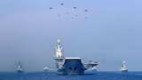 China sends navy ships and a large group of warplanes toward Taiwan