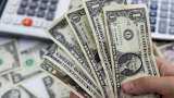 Dollar at 15-month low as easing inflation firms rate peak bets