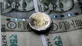 Rupee gains 12 paise to 81.96 against US dollar in early trade