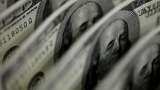 US dollar flat as market awaits clarity from central banks
