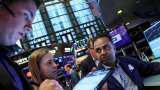 U.S. stocks close little changed as Fed leaves door open