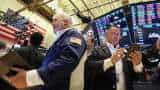 Wall Street stocks down after Fed minutes, bank shares extend losses