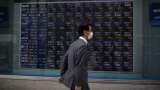 Asian stocks hit 9-month lows on worries over China economy, US rates Asian stocks hit 9-month lows on worries over China economy, US rates