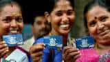 How can Jan Dhan account holders apply for insurance cover?