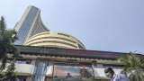 FIRST TRADE: Sensex, Nifty open little changed amid caution ahead of US jobs data release