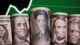 Dollar rides Treasury yields higher, yen battered