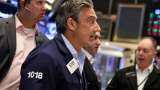 Wall Street ends higher as investors digest economic data ahead of inflation report