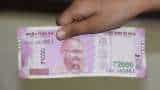 Rupee to trade in tight range as RBI keeps intervening