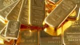 Gold firm as Fed comments signal potential end to US rate hikes