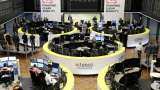 Asian markets news: shares drop sharply as US price data revives rate hike jitters