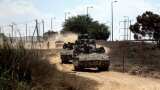 Gaza-Egypt border crossing set to reopen as Israeli troops prepare ground assault