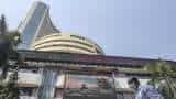 FIRST TRADE: Sensex down over 200 pts, Nifty below 19,400; Titan down over 1%