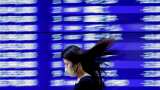 Asian markets update | Wall Street rally lifts shares, dollar weakens on Fed outlook
