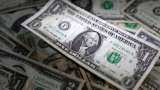 Dollar defensive as markets weigh US rates outlook