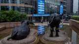 Asia shares start December on cautious note, oil nurses losses