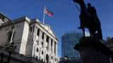 Bank of England holds interest rates at a 15-year high at 5.25% despite economic woes 