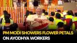 PM Modi Applauds Ayodhya Ram Mandir Builders; Showers Them With Petals