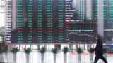 Asian markets news: Stocks slump as traders dial back rate cut bets