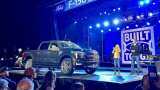 Ford slows EVs, sends a truckload of cash to investors