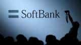 Japan's SoftBank Group marks a return to profit as it cuts Vision Fund losses