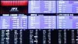 Asian markets news: Stocks edge down; dollar rides Treasury yields higher